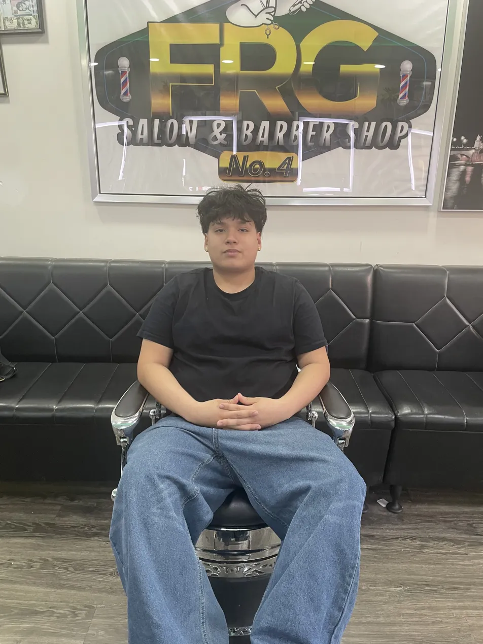 John, Barber at FRG Barbershop